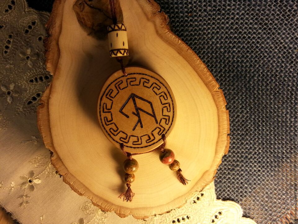 amulet with a good luck rune photo 1